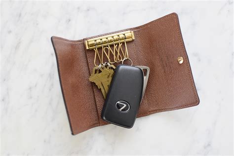 louis vuitton key pouch vs key holder|authentic Louis Vuitton keychain.